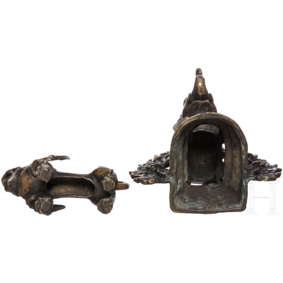 A Thai bronze candlestick and animal figurine, 1st half of the 20th century
