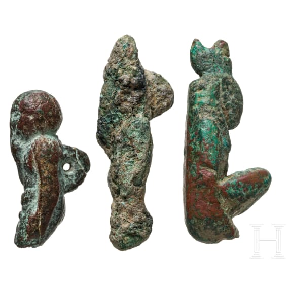 Three Egyptian miniature bronze pendants with deities, 2nd - 1st millennium B.C.