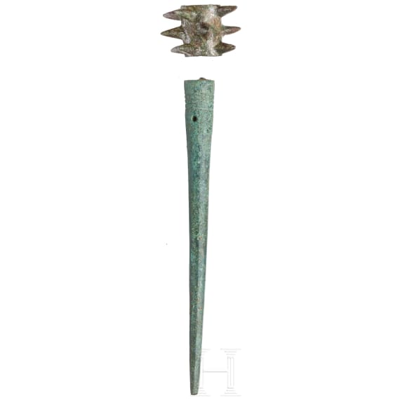 A Western Iranian spiked mace head and a lance shoe, Luristan, 3rd - 2nd millennium B.C.