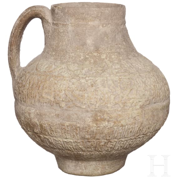 An East Persian jug with relief decoration, 12th - 13th century