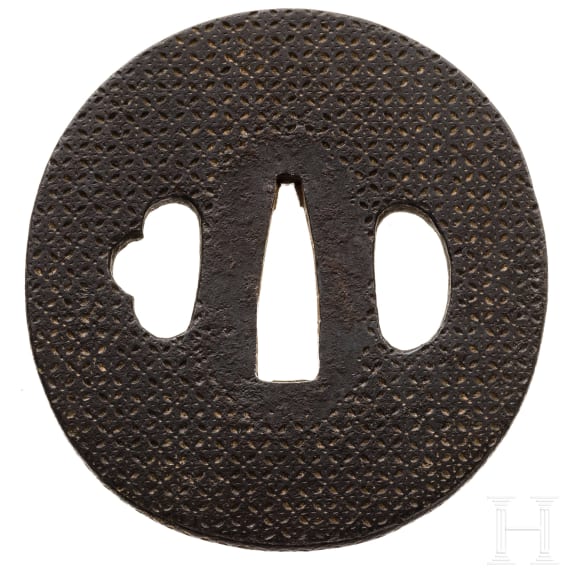 A Japanese tsuba, circa 1800