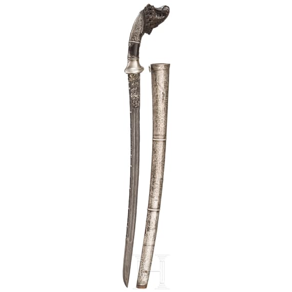 An Indonesian klewang with silver incrusted Damascus blade, 19th century