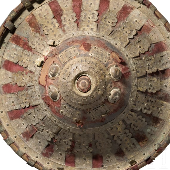 Three decorated Amhara shields, a stool and a beaker