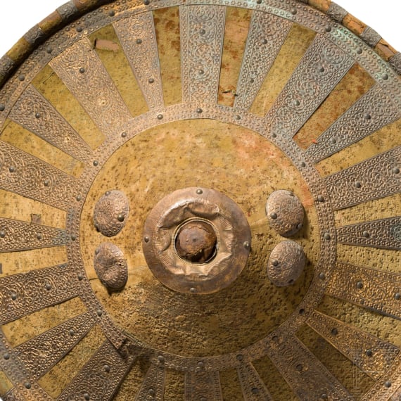 Three decorated Amhara shields, a stool and a beaker