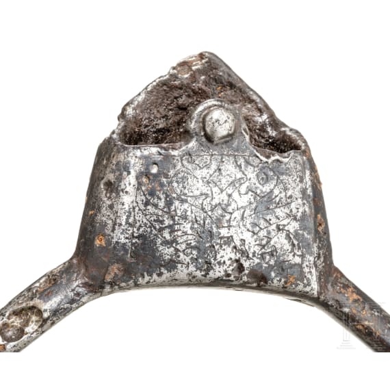 An engraved Salic stirrup, 11th/12th century