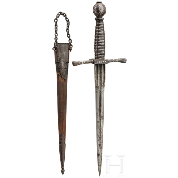 A silver inlaid German left-hand dagger with scabbard, circa 1600