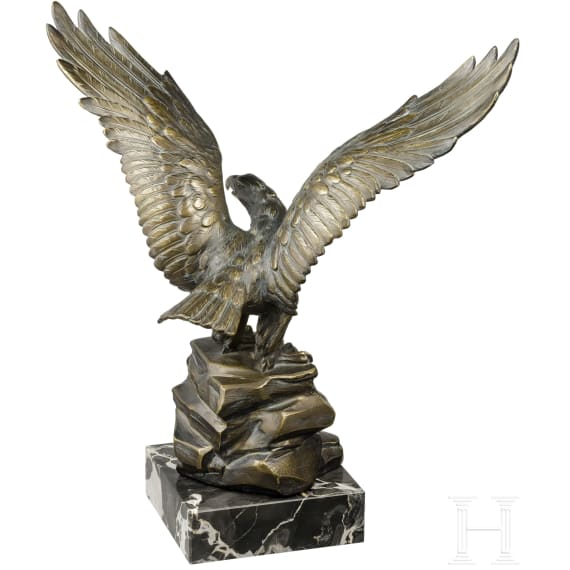 A large table eagle on stone base, 20th century