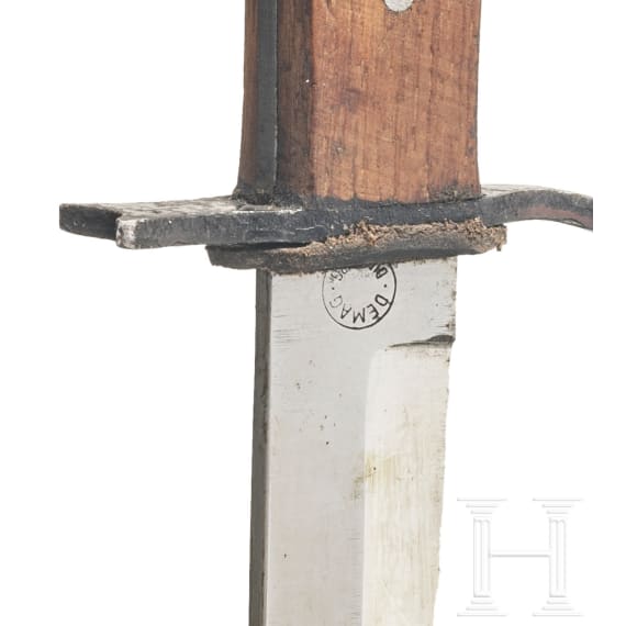 A DEMAG trench knife with wooden grip scales