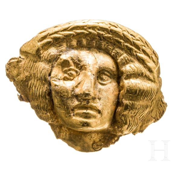 Goldblechapplik in Form eines Frauenkopfes, 4. - 3. Jhdt. v. Chr.