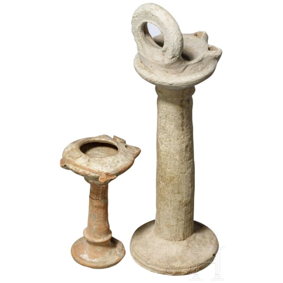 Two tall Byzantine oil lamps, 5th - 9th century