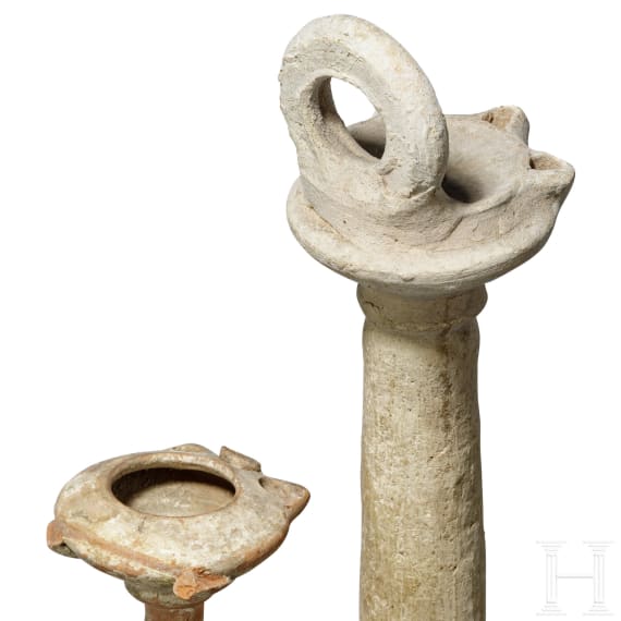 Two tall Byzantine oil lamps, 5th - 9th century