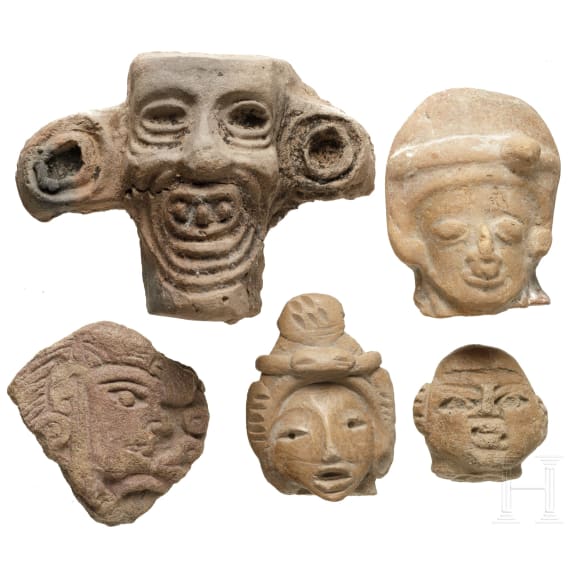 Two pre-Colombian vessels and five terracotta heads