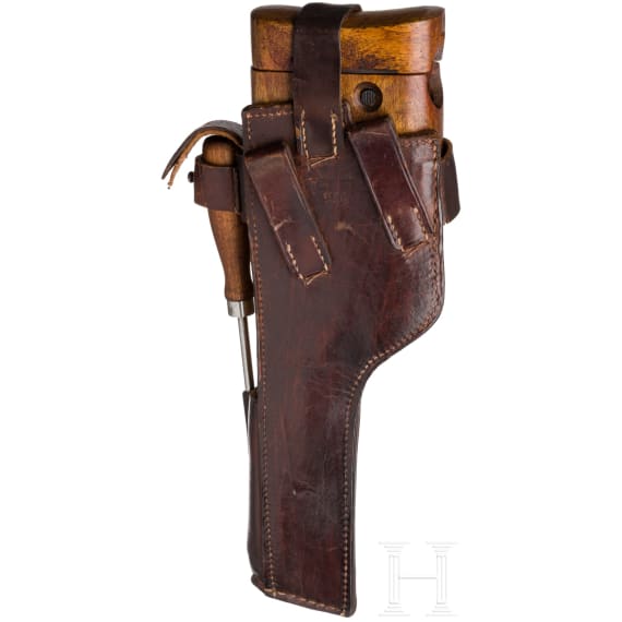 A Mauser C 96/16 with matching shoulder stock and leather harness,