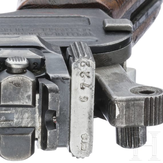 A Mauser C 96/16, with shoulder stock and leather harness, Czech contract