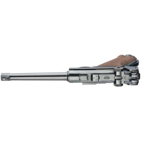 A Luger pistol Mod. 04 (1906) by DWM, with holster