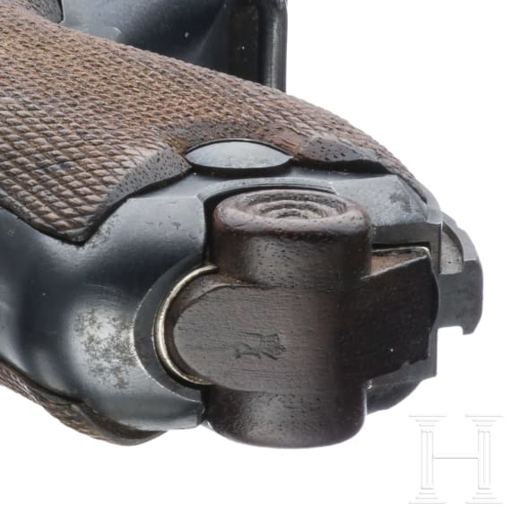 A Luger pistol Mod. 04 (1906) by DWM, with holster