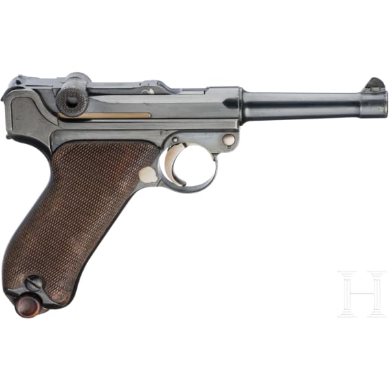 A Luger pistol by DWM, "First Issue", with holster