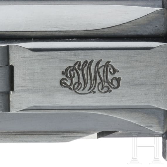 A Luger pistol by DWM, "First Issue", with holster