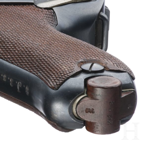 A Luger pistol by DWM, "First Issue", with holster