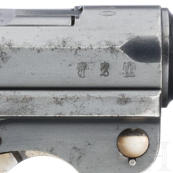 A Luger pistol by DWM, 1910, no hold-open; Bavaria