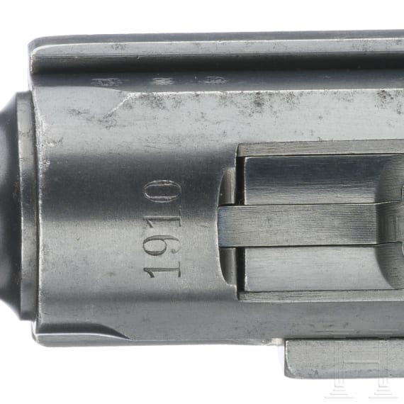 A Luger pistol by DWM, 1910, no hold-open; Bavaria