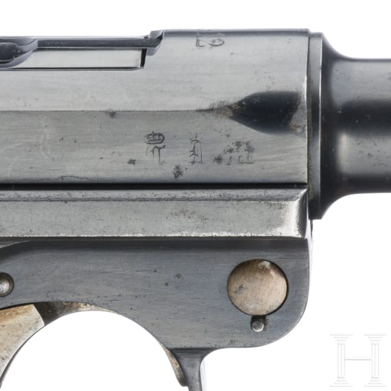A Luger pistol by DWM, 1912, with holster