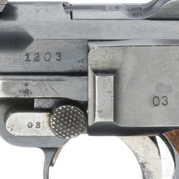 An Artillery Luger by DWM, 1914, "EWB" marking, with shoulder stock and holster