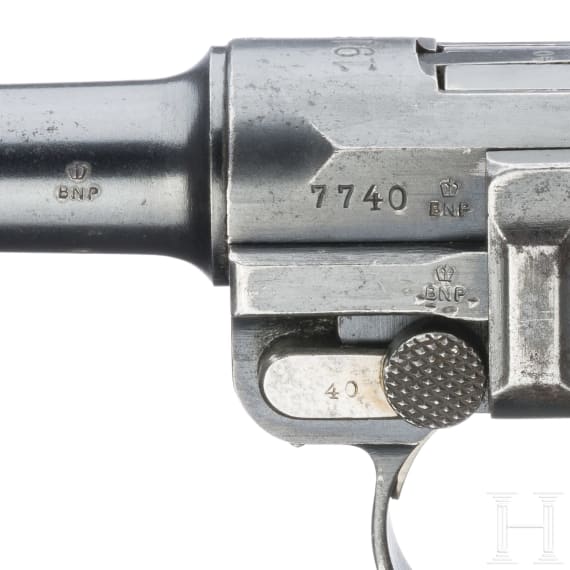 A Luger pistol by DWM, 1915, with holster