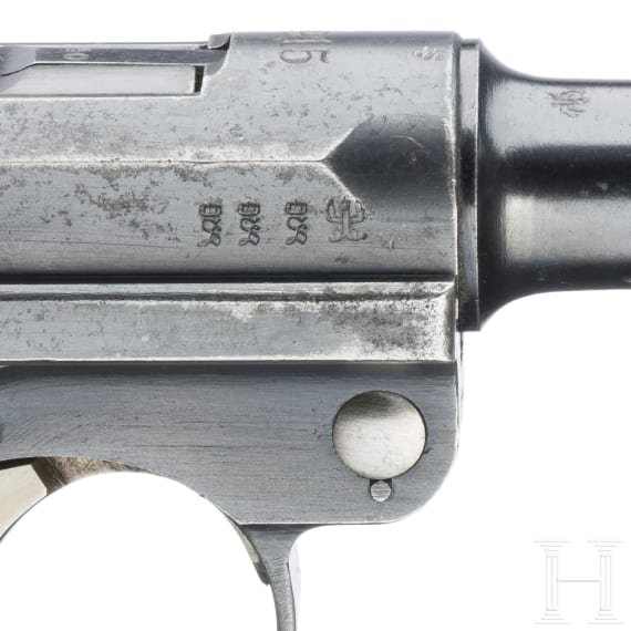 A Luger pistol by DWM, 1915, with holster