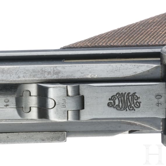 A Luger pistol by DWM, 1915, with holster