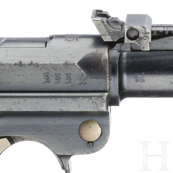 An Artillery Luger by DWM, 1915, with shoulder stock and holster