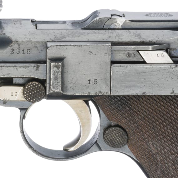 An Artillery Luger by DWM, 1915, with shoulder stock and holster
