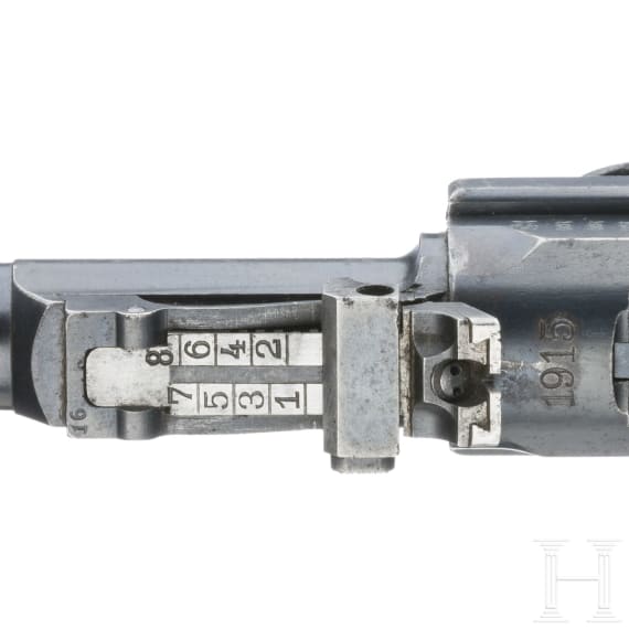 An Artillery Luger by DWM, 1915, with shoulder stock and holster