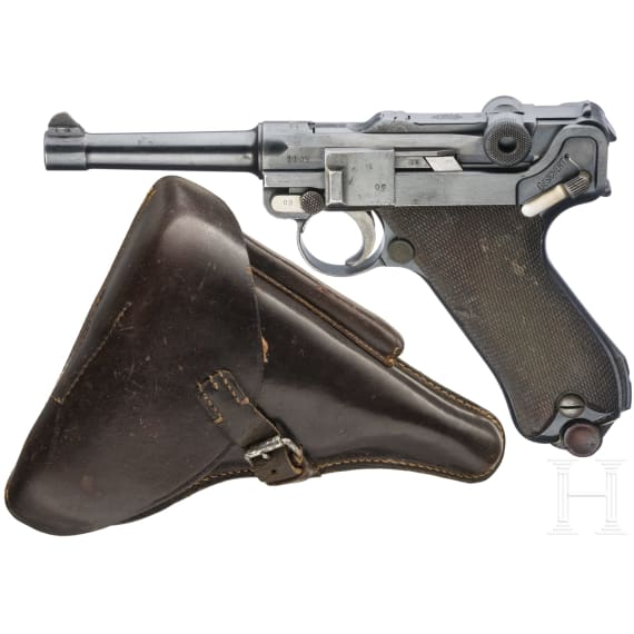 A Luger pistol by DWM, 1916, with holster