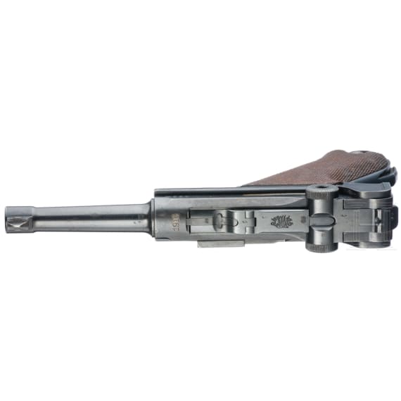 A Luger pistol by DWM, 1916, with holster