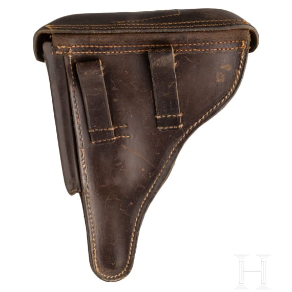 A Luger pistol by DWM, 1916, with holster