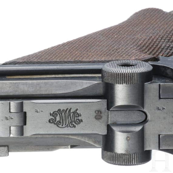 A Luger pistol by DWM, 1916, with holster
