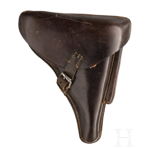 A Luger pistol by DWM, 1916, with holster