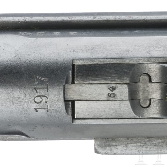 A Luger pistol by DWM, 1917, with holster