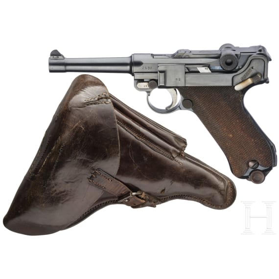 A Luger pistol by DWM, 1917, with holster