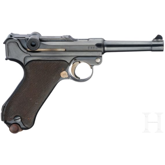 A Luger pistol by DWM, 1917, with holster