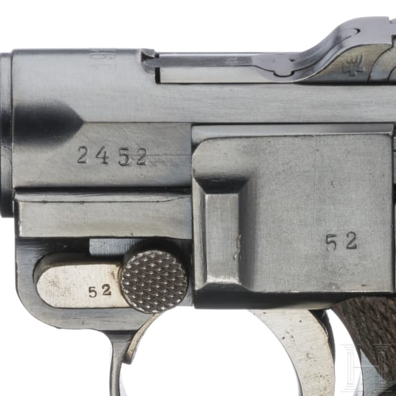 A Luger pistol by DWM, 1917, with holster