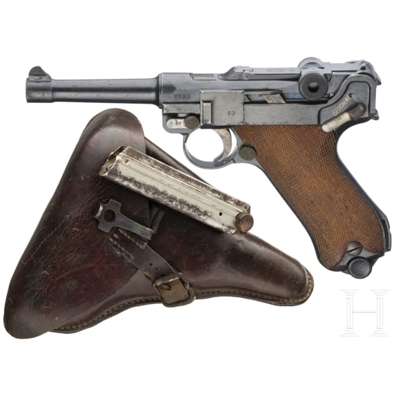A Luger Pistol by DWM, 1918, with holster