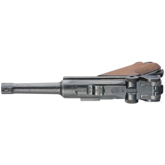 A Luger Pistol by DWM, 1918, with holster