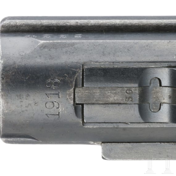 A Luger Pistol by DWM, 1918, with holster