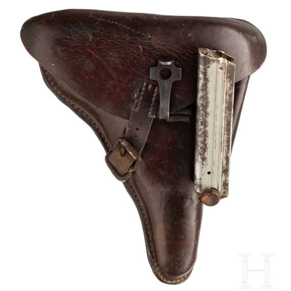 A Luger Pistol by DWM, 1918, with holster
