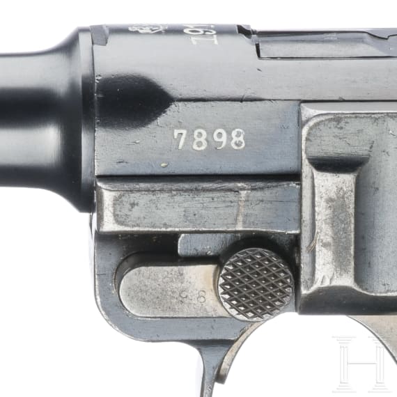 A Luger pistol by DWM, 1918, "Lazy S Death's Head"