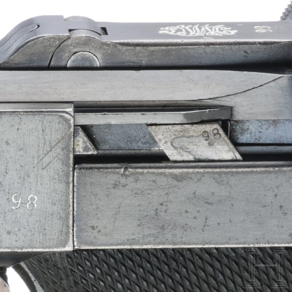 A Luger pistol by DWM, 1918, "Lazy S Death's Head"