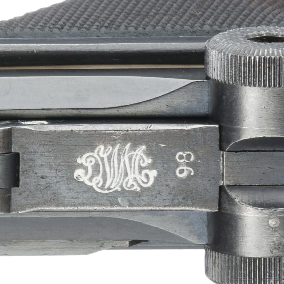 A Luger pistol by DWM, 1918, "Lazy S Death's Head"