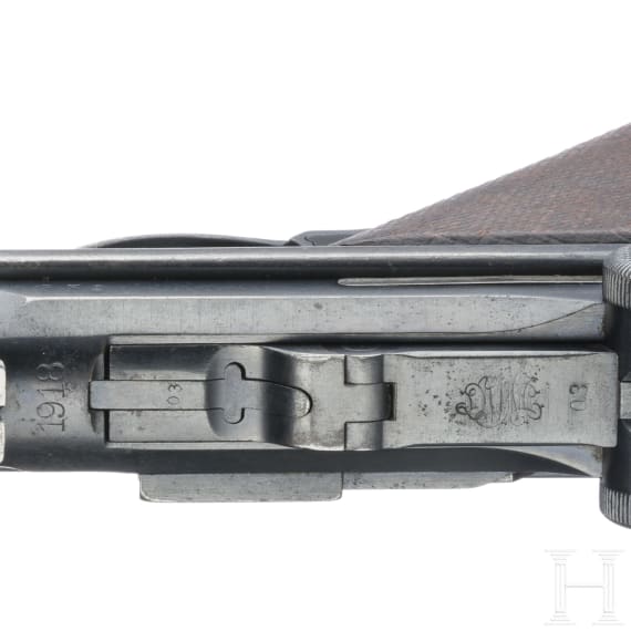 An Artillery Luger by DWM, 1918, with shoulder stock and holster